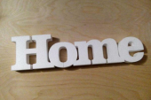 Слово "Home" из пенопласта
